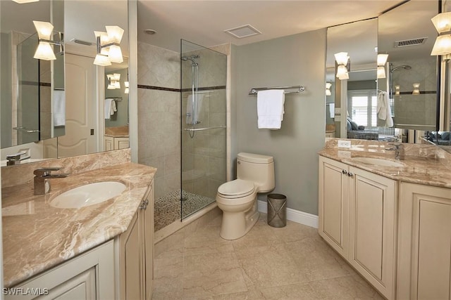 bathroom with vanity, toilet, and walk in shower