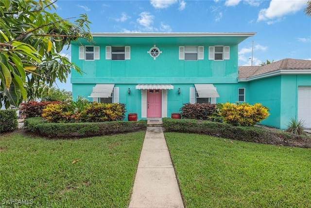 view of front of house featuring a front yard