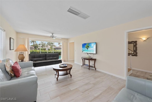 living room with ceiling fan