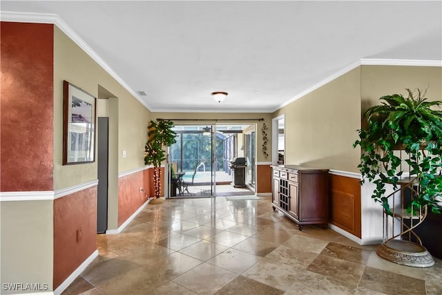 corridor featuring crown molding