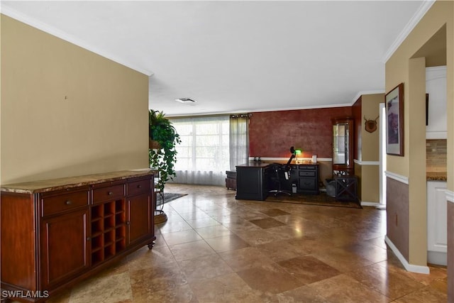 living room featuring crown molding