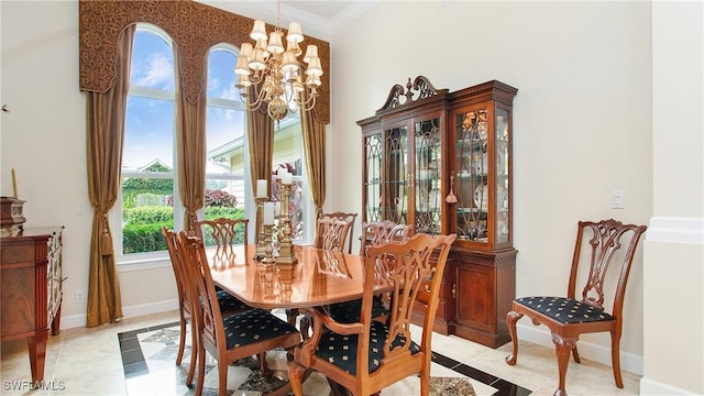 dining area featuring a chandelier, light tile patterned floors, a wealth of natural light, and crown molding