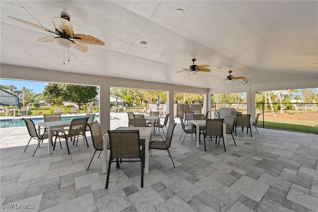 view of patio with a fenced in pool