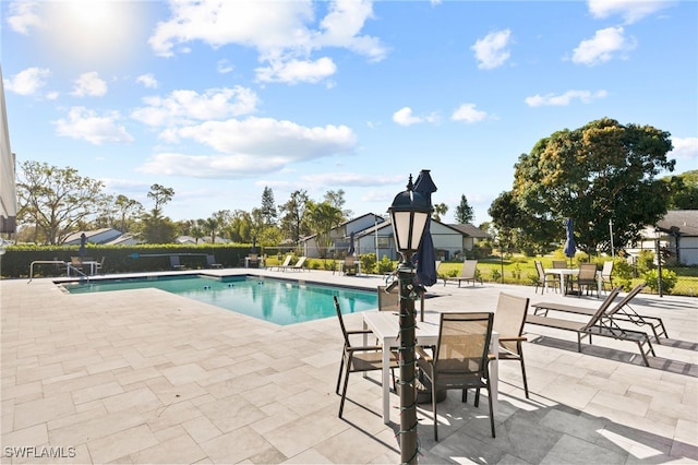 view of pool with a patio area