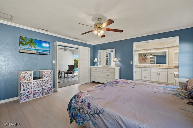 bedroom with ceiling fan, ensuite bathroom, light hardwood / wood-style floors, and ornamental molding