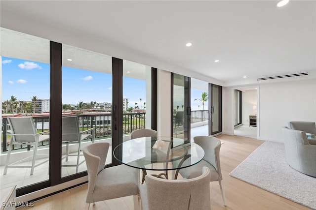 dining area featuring light hardwood / wood-style flooring