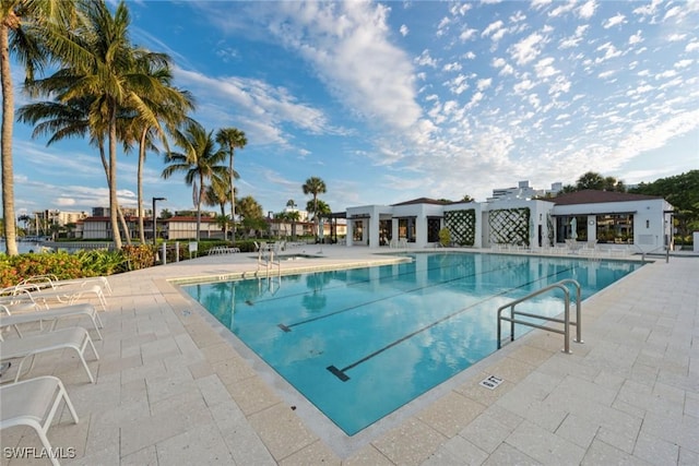 view of swimming pool with a patio area