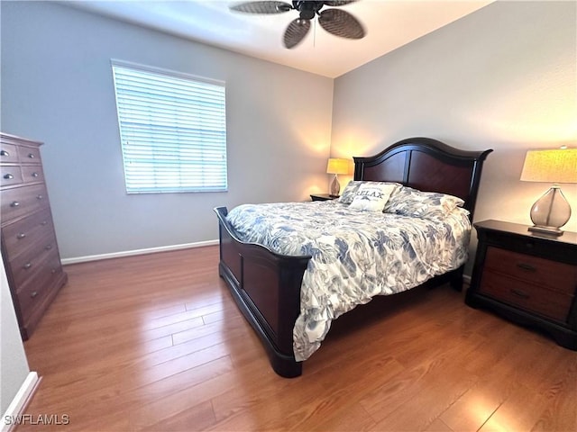 bedroom featuring ceiling fan and wood-type flooring