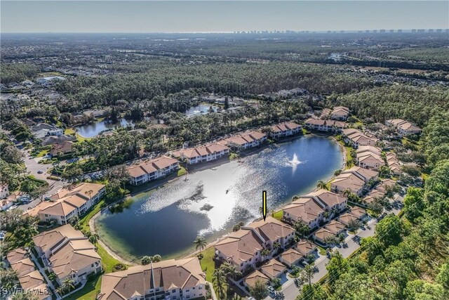 aerial view featuring a water view and a residential view