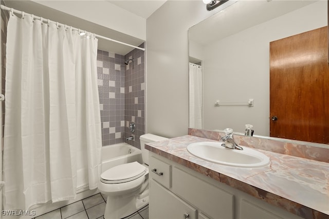 full bathroom with toilet, shower / bath combination with curtain, vanity, and tile patterned floors