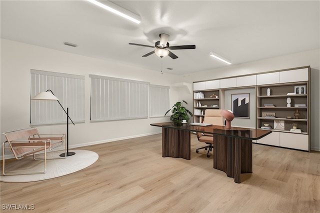 office area featuring ceiling fan and light wood-type flooring