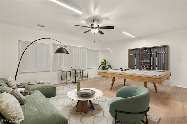 game room featuring ceiling fan, pool table, and light wood-type flooring