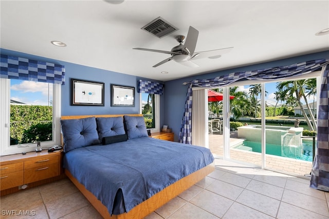 bedroom featuring access to outside, ceiling fan, and light tile patterned flooring