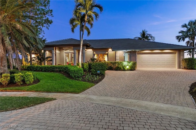 view of front of home featuring a garage