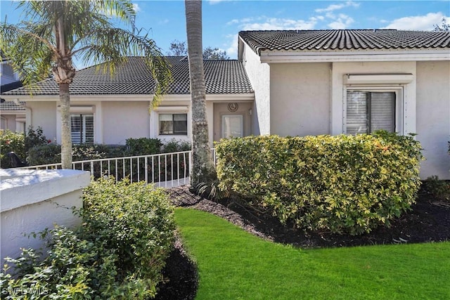 view of property exterior featuring a yard