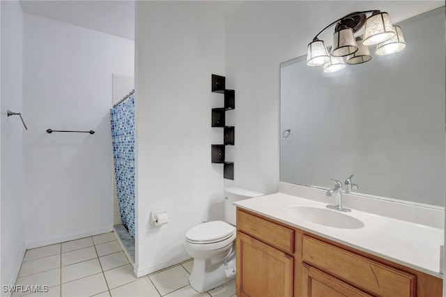 bathroom featuring vanity, toilet, tile patterned flooring, and a shower with shower curtain