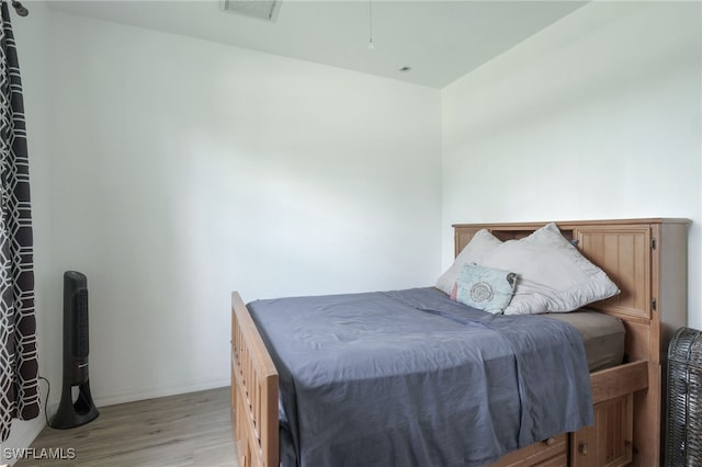 bedroom featuring light wood-type flooring