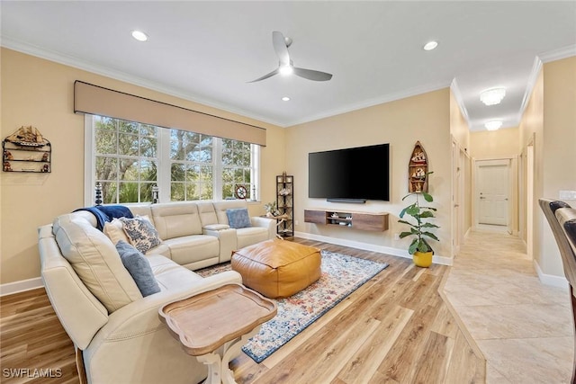 living room featuring ceiling fan, light hardwood / wood-style flooring, and crown molding