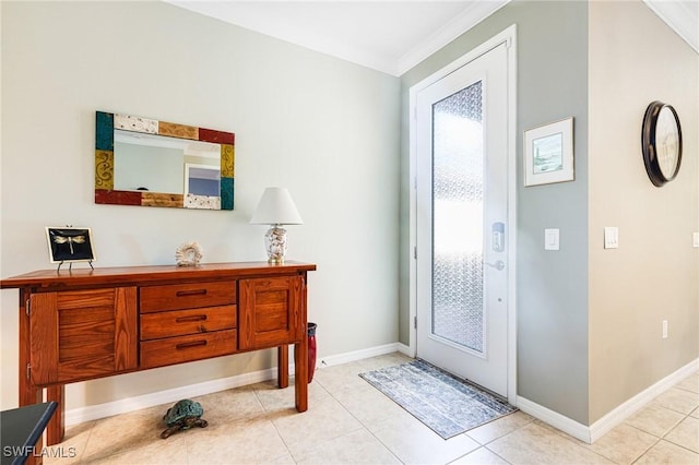 tiled entryway with ornamental molding