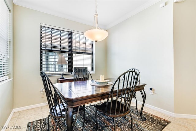 tiled dining area with crown molding