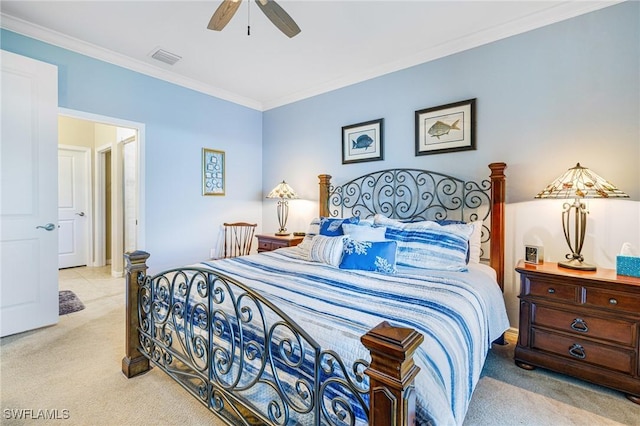 bedroom with ceiling fan, crown molding, and light carpet