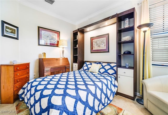 bedroom with crown molding and light carpet