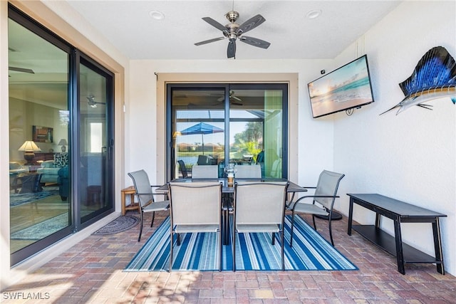 view of patio / terrace featuring ceiling fan