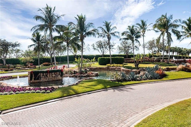 view of community featuring a yard