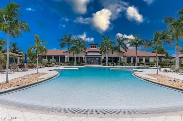 view of swimming pool with a patio