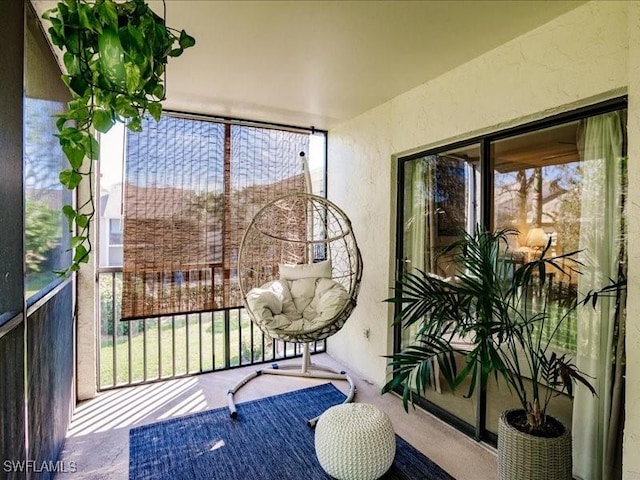 sunroom featuring a healthy amount of sunlight