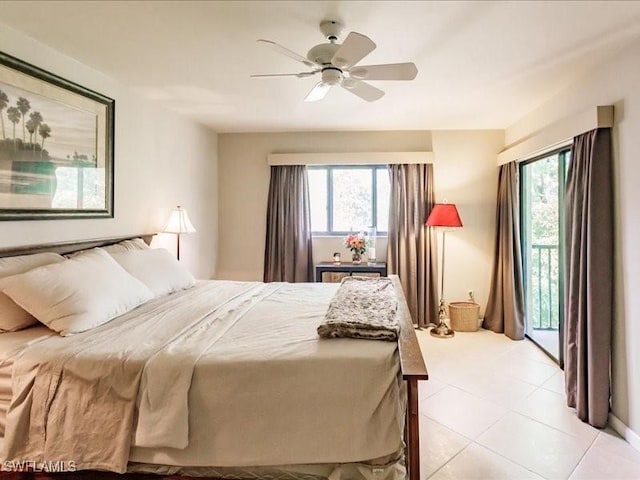 bedroom with ceiling fan, access to exterior, light tile patterned floors, and multiple windows