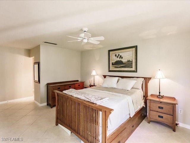 bedroom with light tile patterned floors and ceiling fan