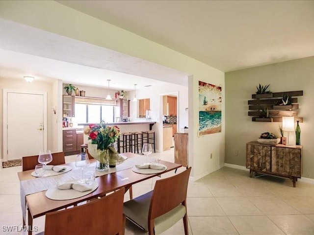 dining room featuring light tile patterned floors