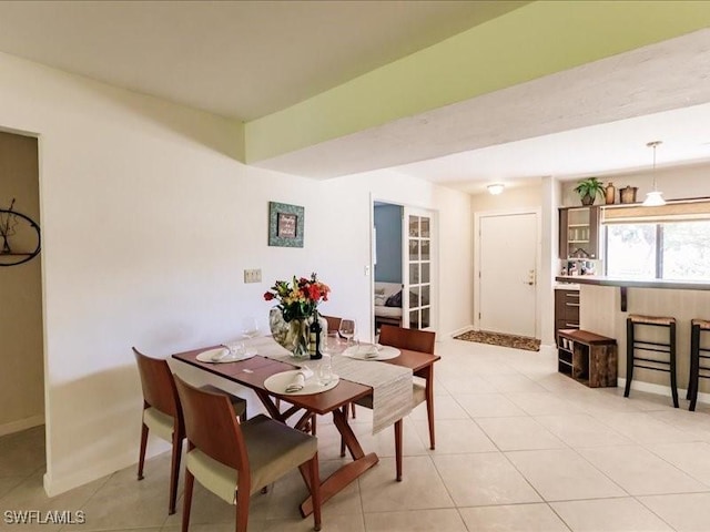 dining room featuring light tile patterned floors