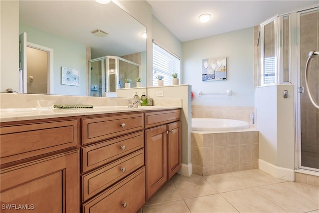 bathroom featuring separate shower and tub, tile patterned floors, and vanity