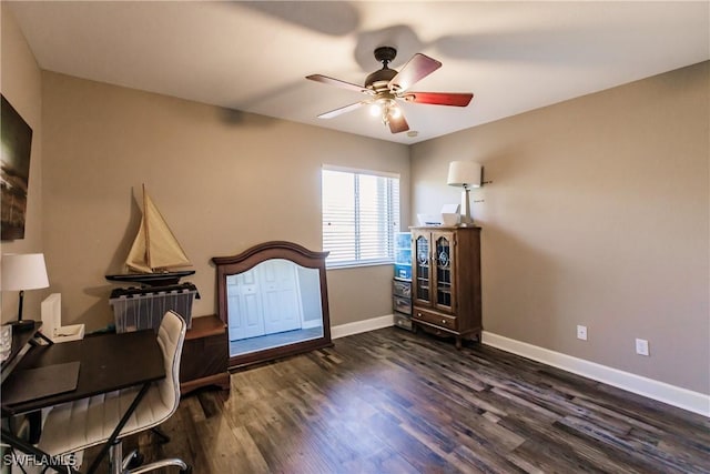 bedroom with ceiling fan and dark wood-type flooring