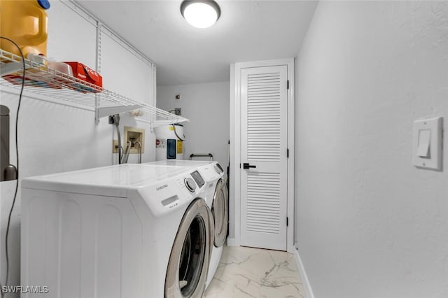 laundry room featuring independent washer and dryer