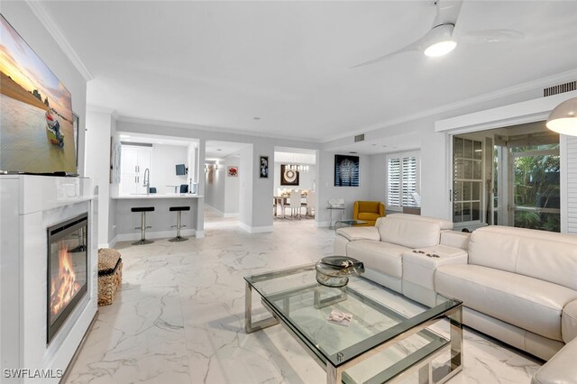 living room featuring ornamental molding