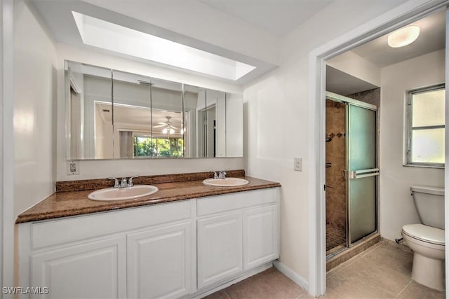 bathroom featuring tile patterned floors, a wealth of natural light, and an enclosed shower