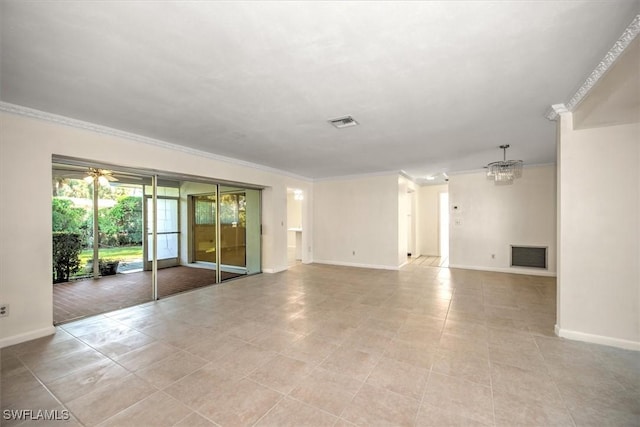 tiled spare room featuring ceiling fan with notable chandelier and ornamental molding