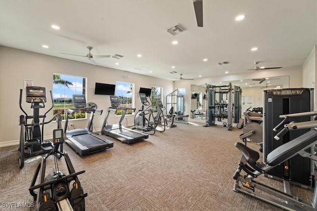 gym featuring ceiling fan and carpet