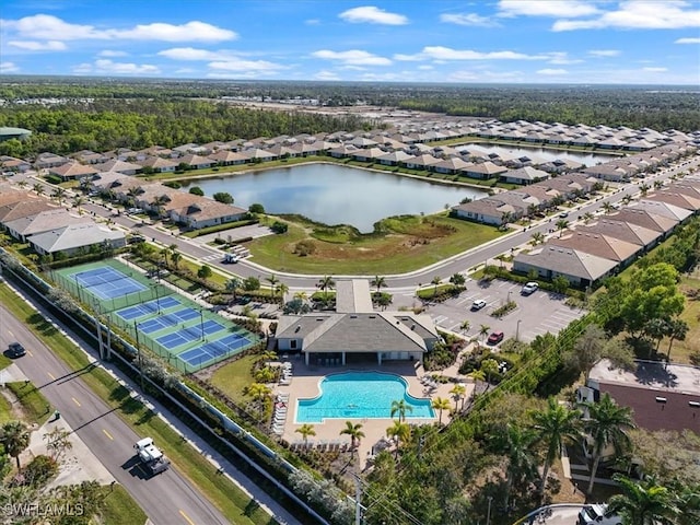 birds eye view of property featuring a water view