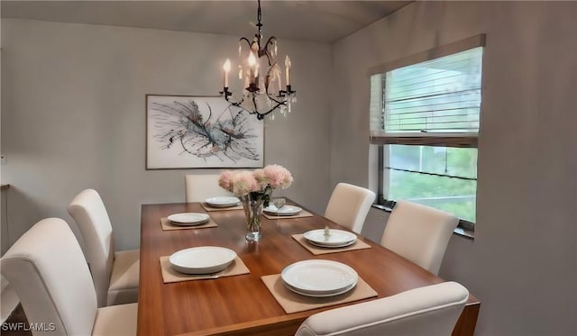 dining area featuring a chandelier