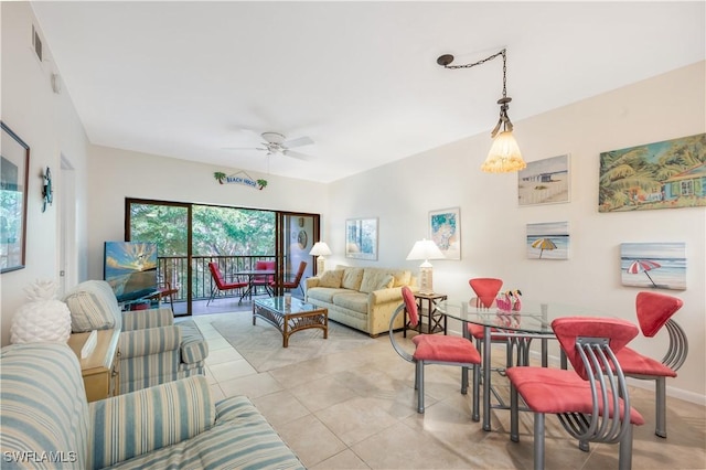 living room featuring ceiling fan and light tile patterned flooring