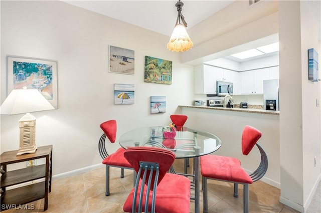 view of tiled dining area