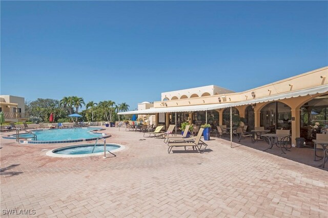 view of pool with a patio area