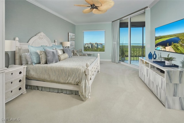 bedroom featuring ceiling fan, crown molding, light carpet, and access to outside