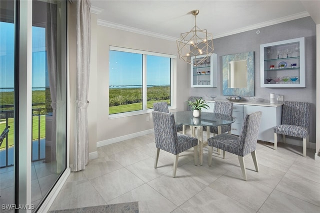 tiled dining space featuring crown molding and a chandelier