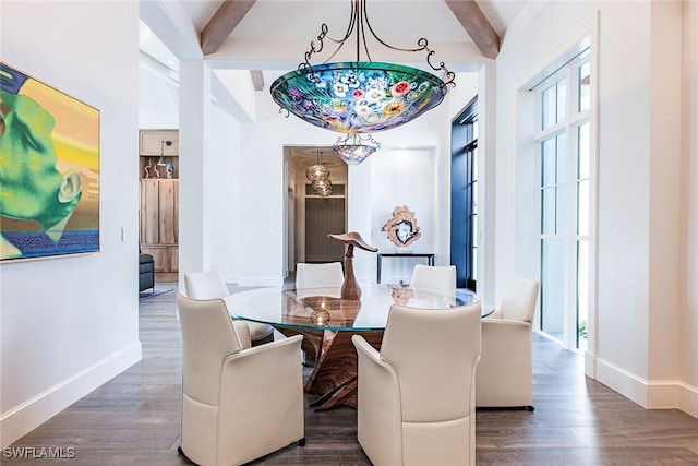 dining area featuring beamed ceiling, an inviting chandelier, and dark wood-type flooring