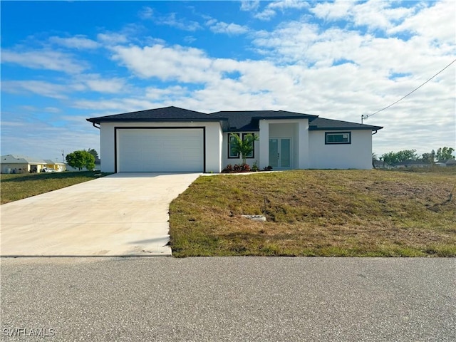 ranch-style home with a front yard and a garage